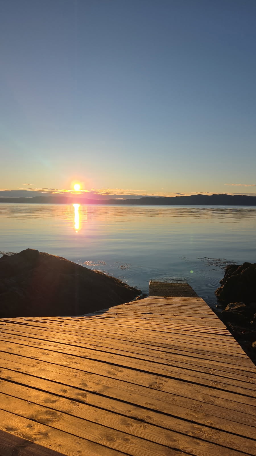 Solnedgang over fjorden — Light of Soul School of Energy